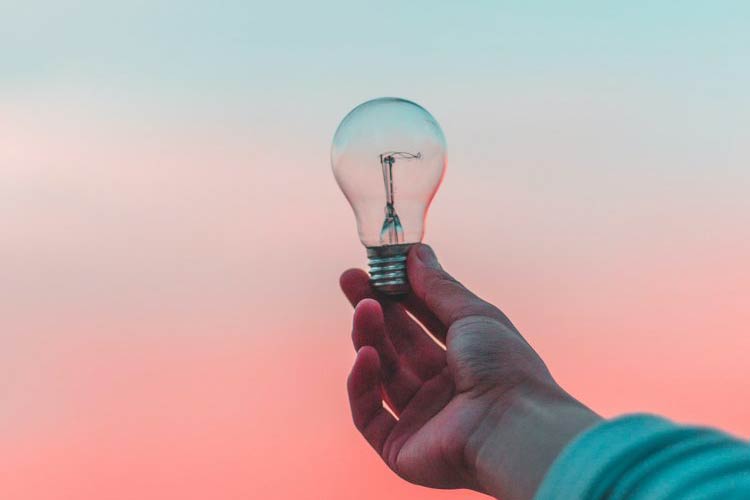 Holding a Light Bulb