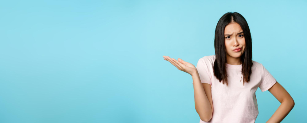 confused lady shrugging wondering whats happening